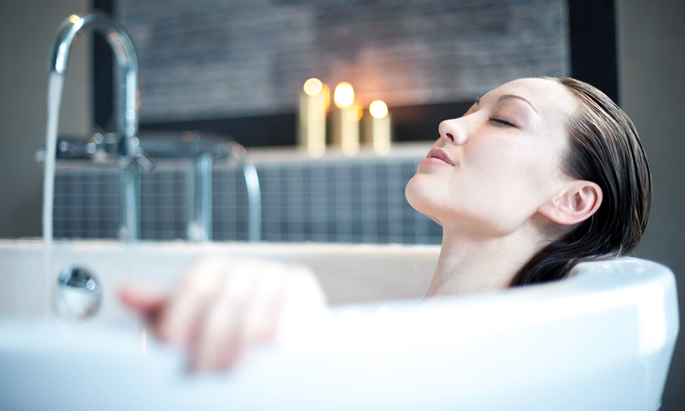 woman relaxing in the bath