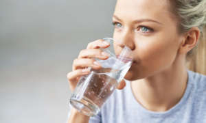 woman drinking water blood pressure