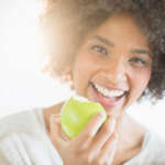 eating a green apple
