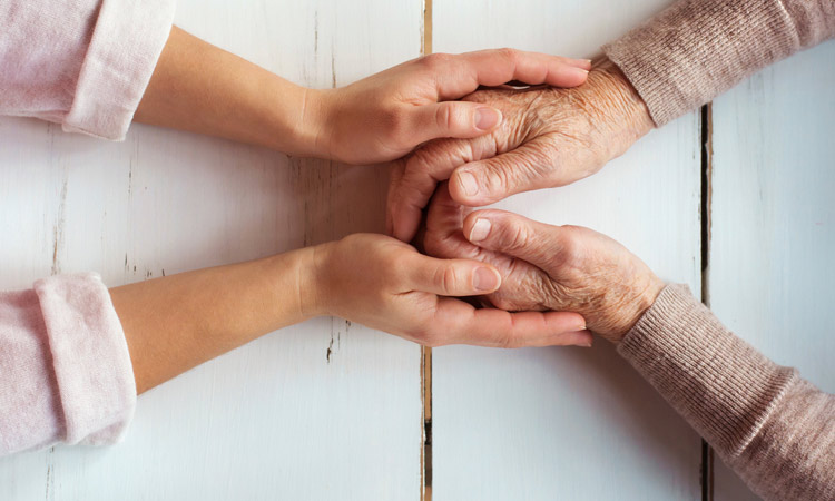 Holding hands on table