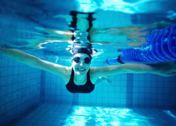 4 Swimming Workouts For Strength Training and Injury Prevention