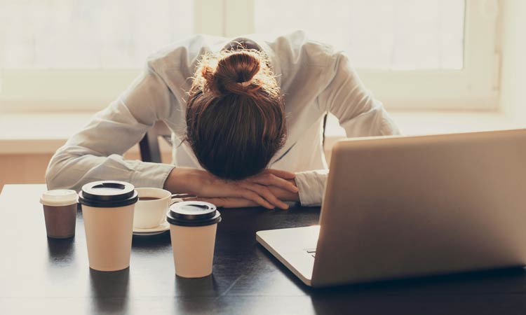 woman sleeping at work