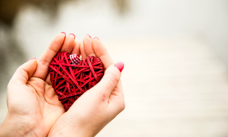 Let-Your-Own-Brand-of-Kindness-Shine-This-Giving-Tuesday heart in hand