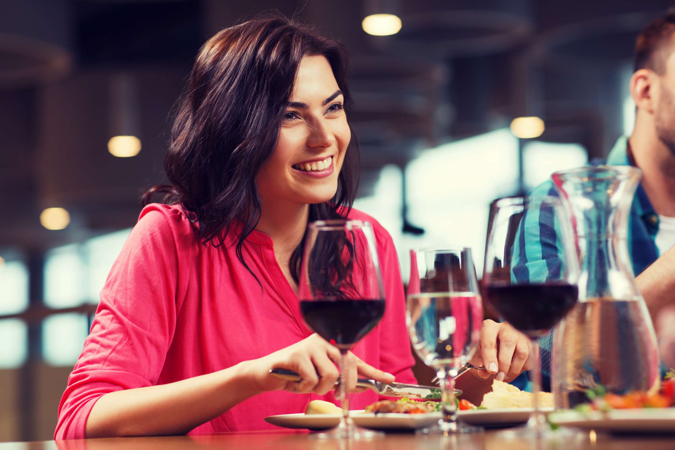 woman eating healthy vegan dinner